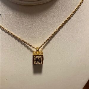 Nina Ricci Gold plated stainless steel Pendant Necklace with rhinestones